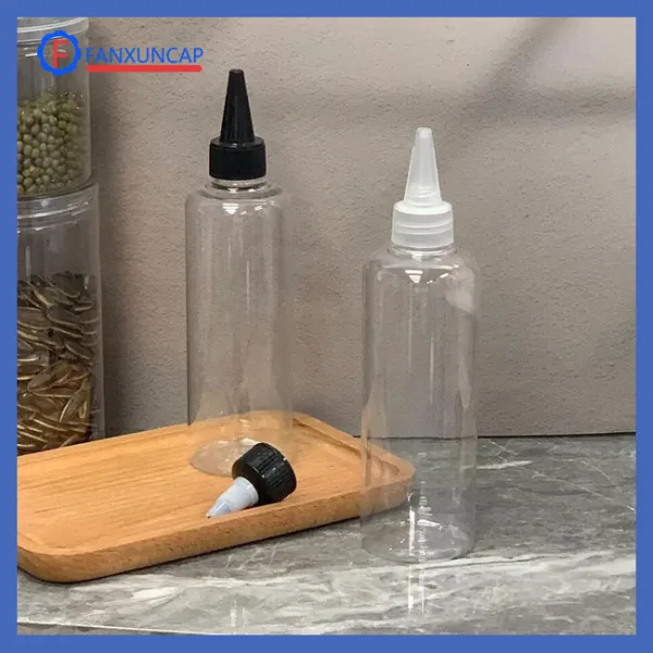 Pointed squeeze plastic bottle with twisted lid
